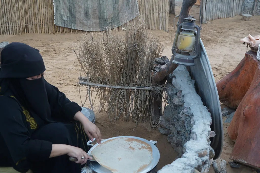 Fresh Arabic bread being baked at the camp