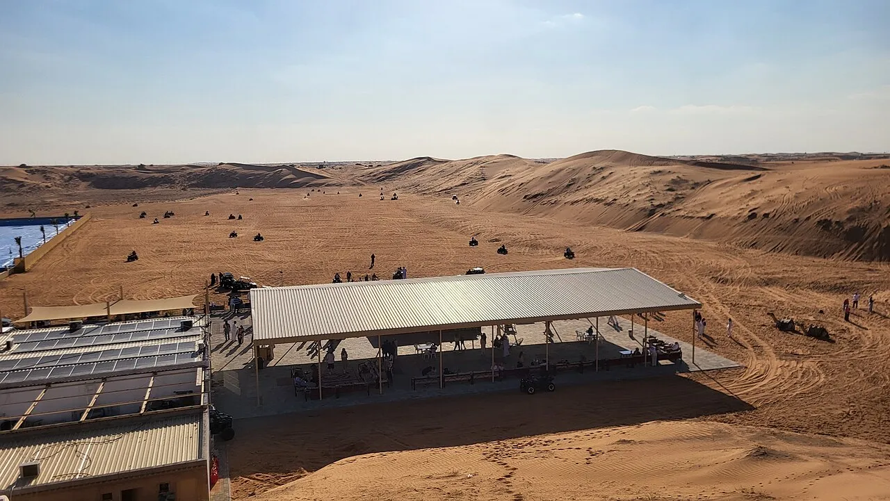 Quad bikes on the red sand next to the Lahbab desert camp